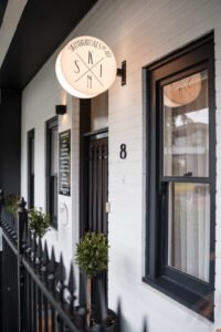 Close-up of a facial massage treatment focused on jaw and cheek area, representing emotional release through bodywork